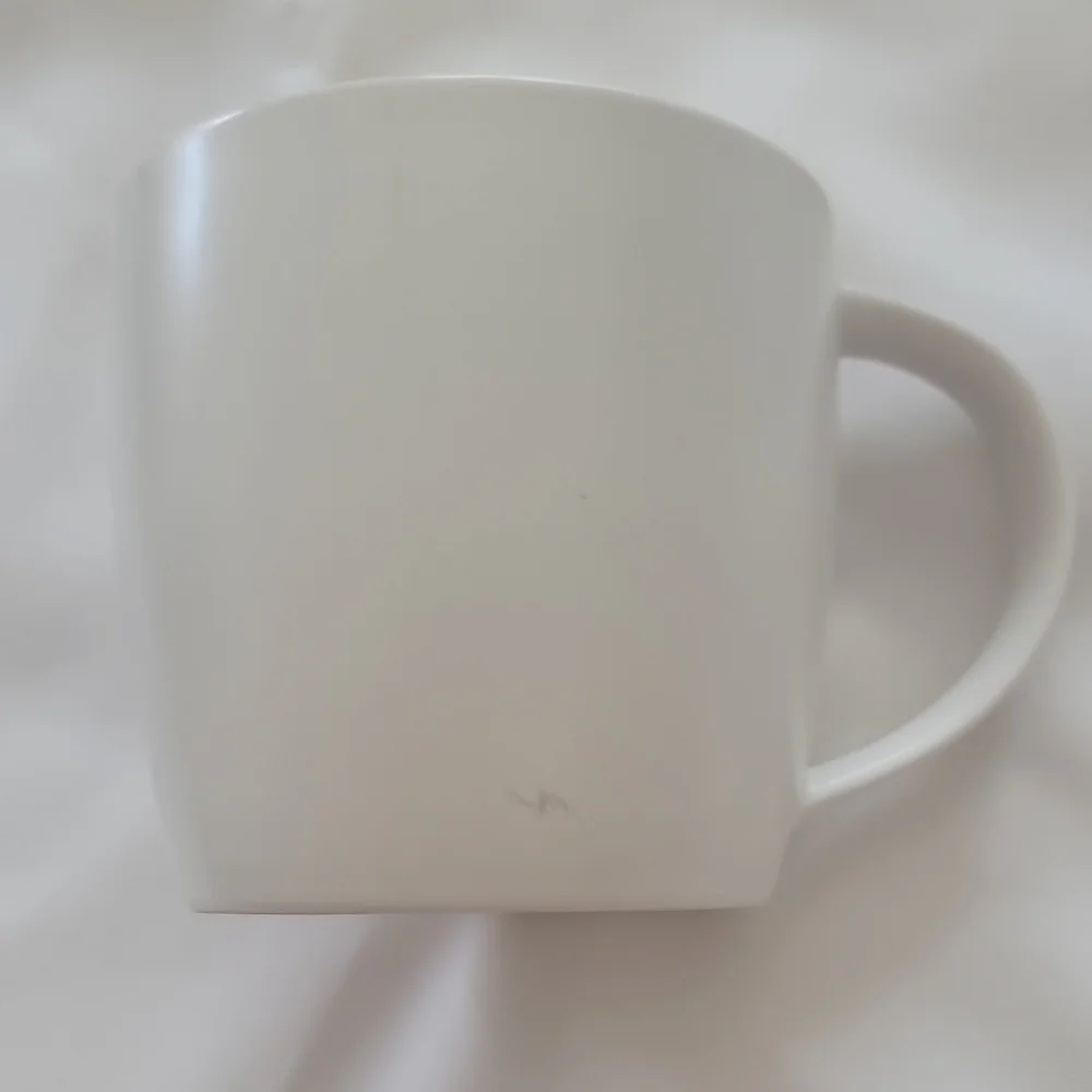 Starbucks 2011 New Bone China White Coffee Mug W/ Yellow Liner.